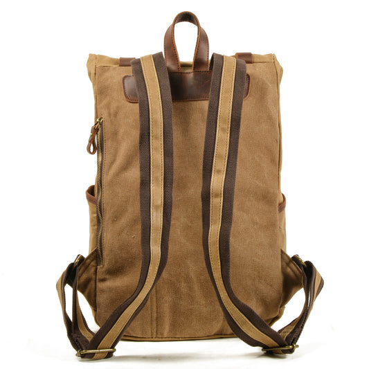 Back of the roll top backpack with padded shoulder straps and adjustable webbing
