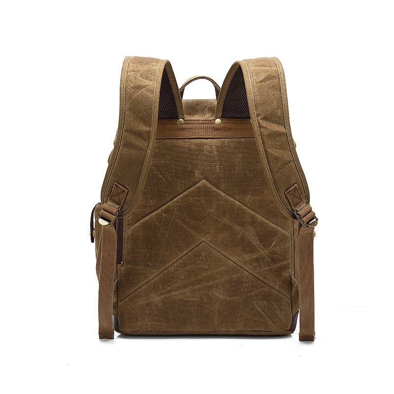 Rear of the khaki rucksack with a padded panel and shoulder straps