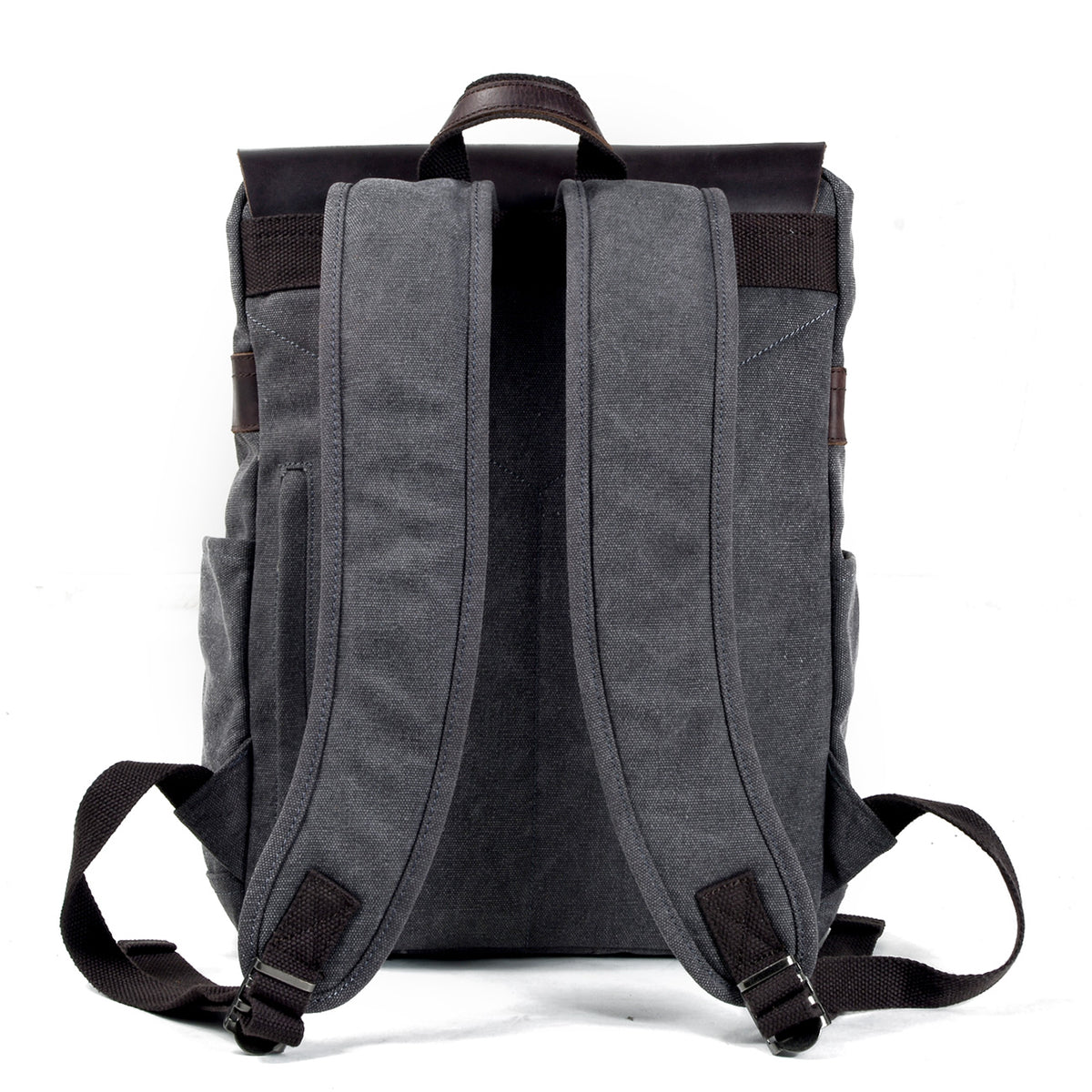 Back of the backpack with padded shoulder straps and a leather top handle