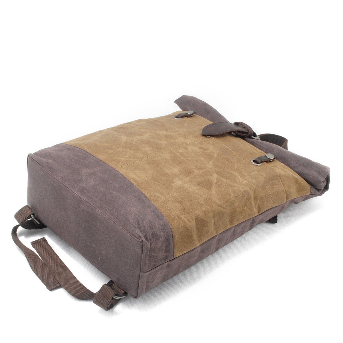 Khaki backpack lying on its front to show the brown base