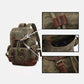 Army Green waxed canvas backpack close-ups of the leather loop, front pocket and buckle.