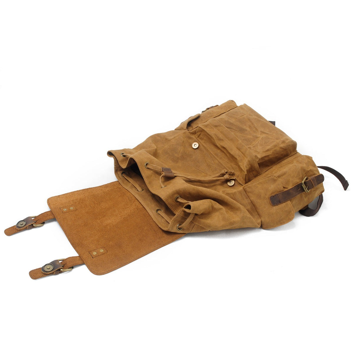 Khaki backpack with the leather flap lifted to show the magnetic buckle
