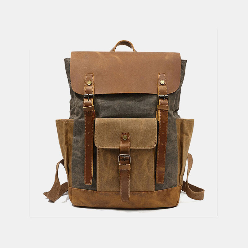 Army Green canvas backpack with a leather flap, twin buckle straps and a front pocket