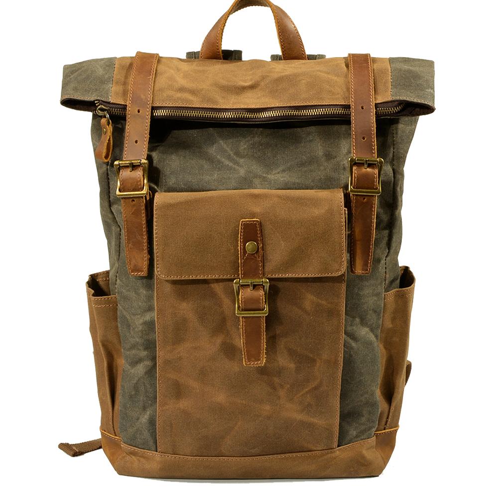 Army green roll top waxed canvas rucksack with brass buckles