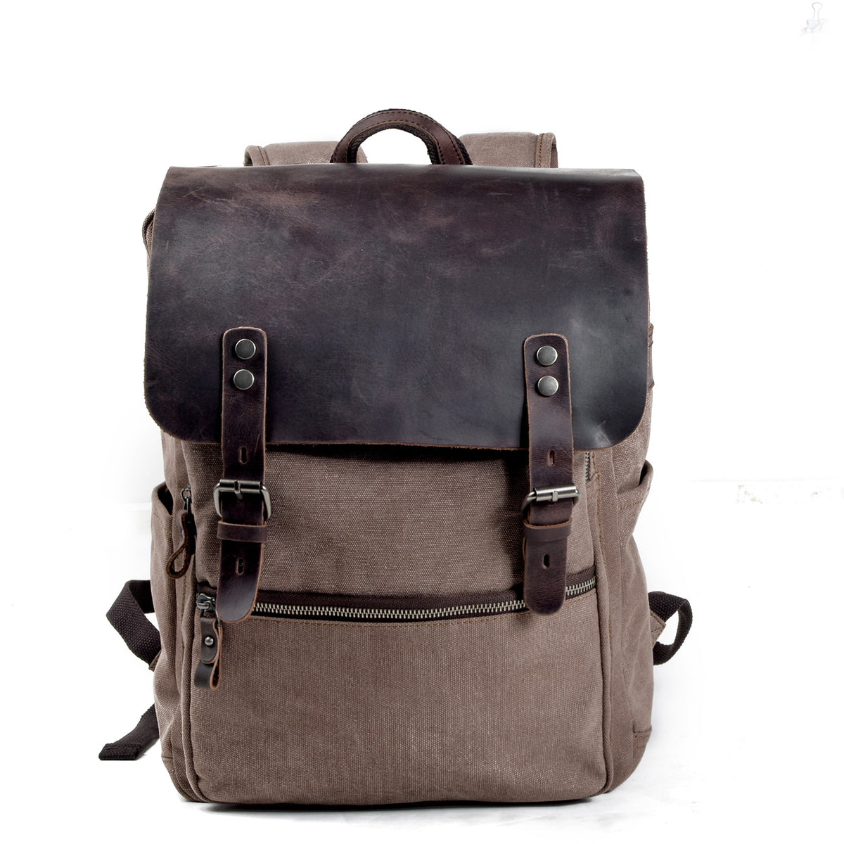 Brown canvas backpack with a crazy horse leather flap and double buckle closure