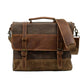 Front view of the bag with a wide leather shoulder pad draped over the flap