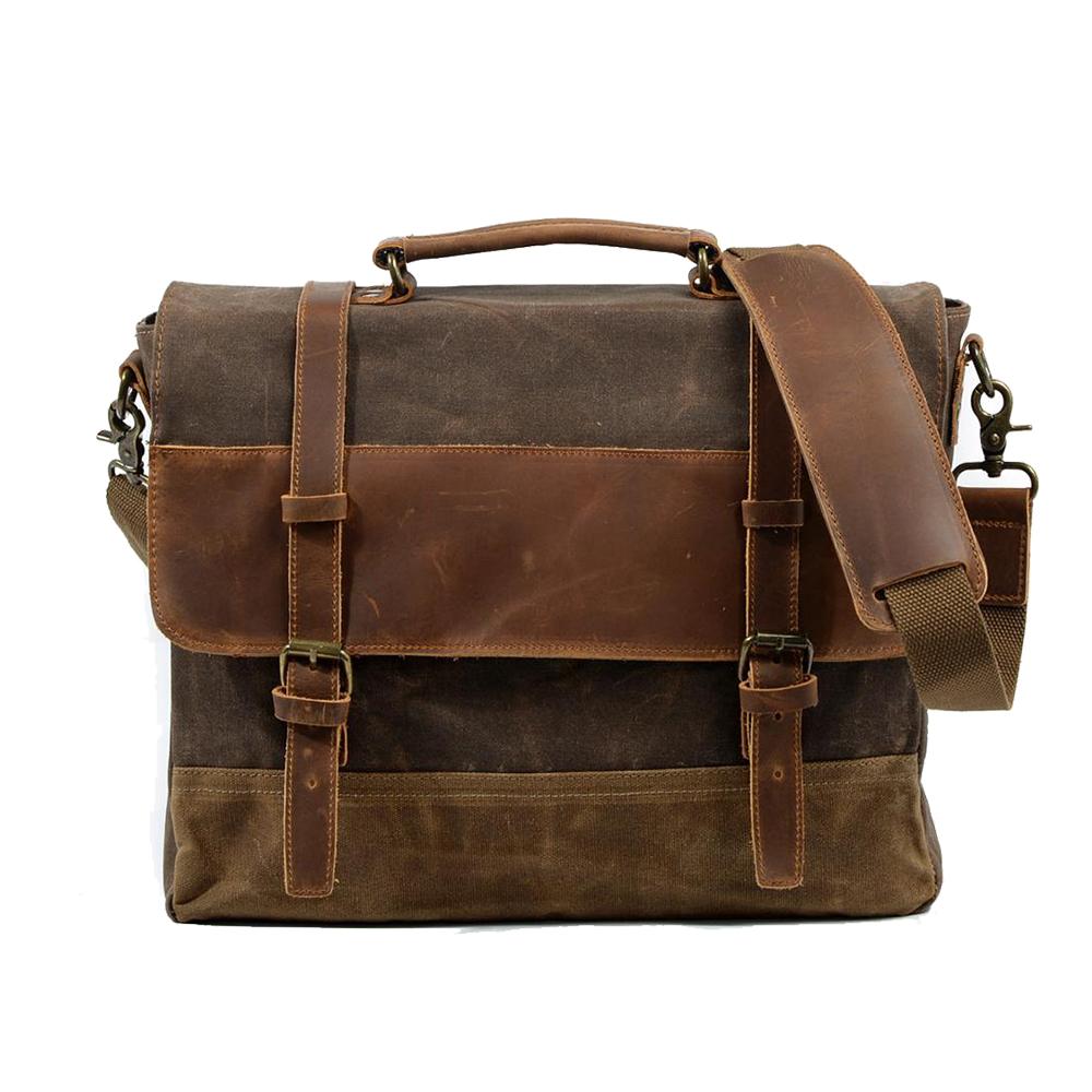 Front view of the bag with a wide leather shoulder pad draped over the flap
