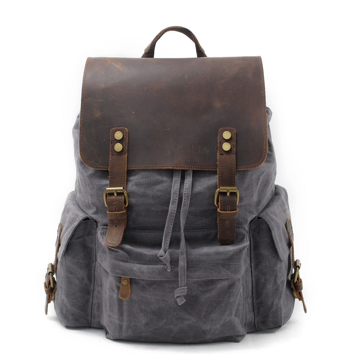 Gray waxed canvas laptop backpack with a brown leather flap and brass buckles