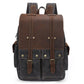 Gray waxed canvas camera backpack, front view with the leather flap and side pockets