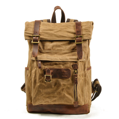 Khaki waxed canvas roll top backpack with leather buckle straps and dual front zippers