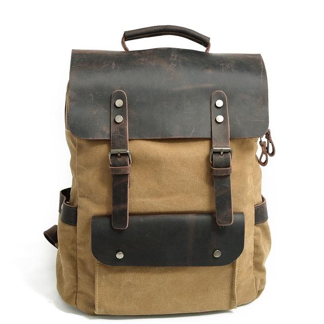 Khaki canvas rucksack with a dark brown leather flap