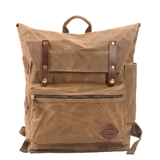 Khaki waxed canvas travel laptop backpack with crazy horse leather straps and a front zip pocket