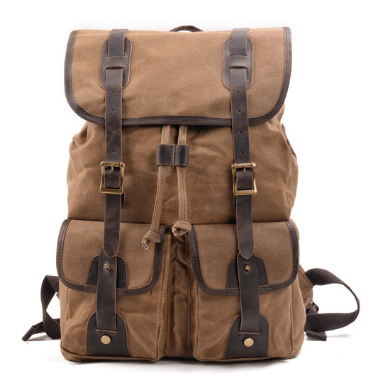 Khaki waxed canvas vintage laptop backpack with crazy horse leather straps and two front pockets