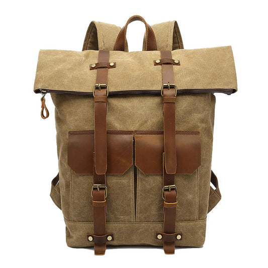 Khaki waxed canvas roll top backpack with crazy horse leather straps and twin front pockets