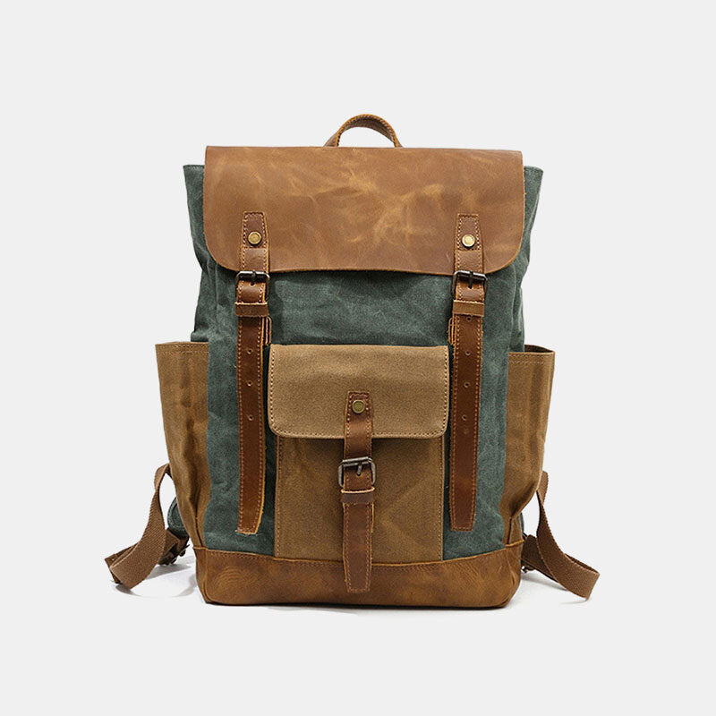 Lake Green canvas backpack with a leather flap, twin buckle straps and a front pocket