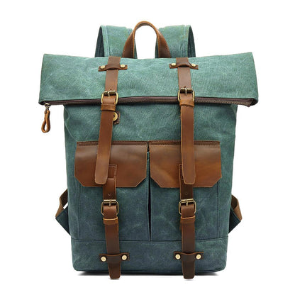 Lake green waxed canvas roll top backpack with brown leather trim