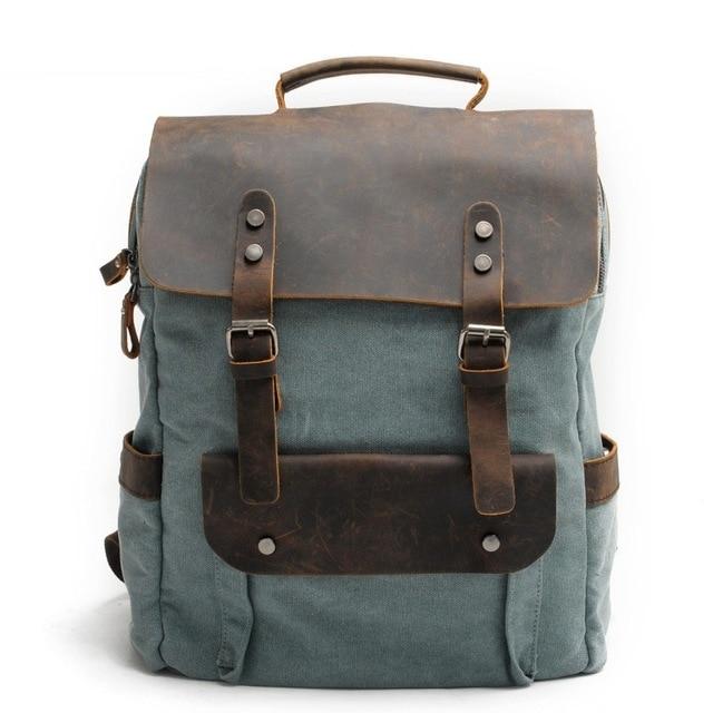 Lake green canvas rucksack with a brown leather flap