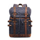 Navy waxed canvas vintage laptop backpack with brown leather straps and side buckles