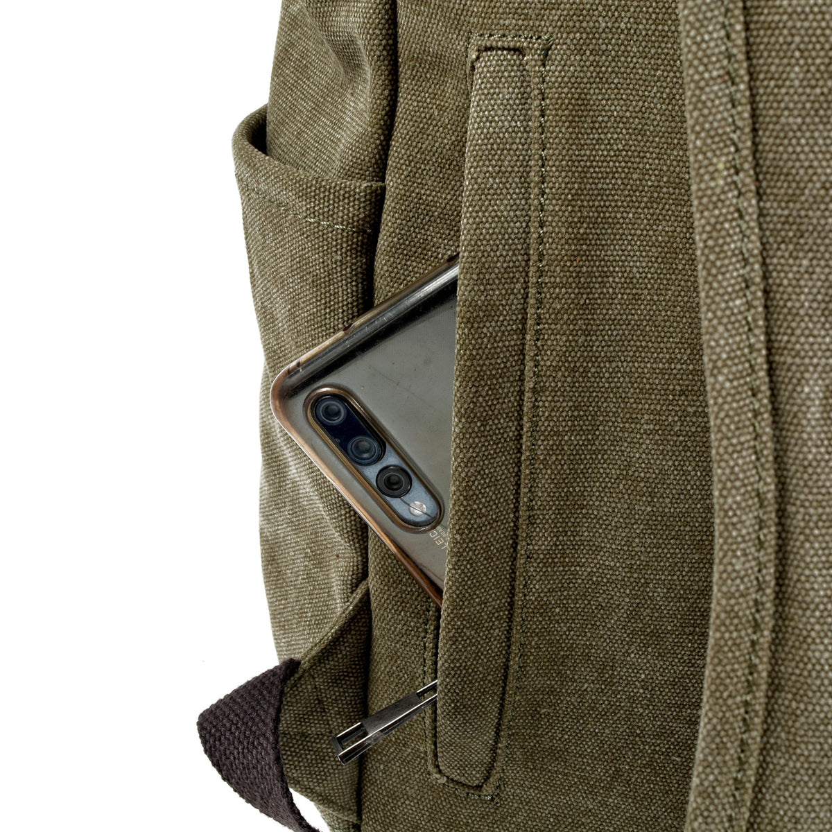 A phone tucked into the zipped rear pocket next to the shoulder strap