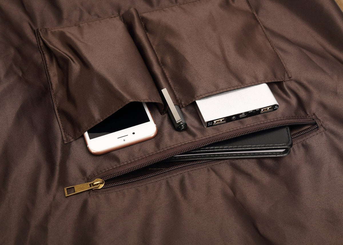 Interior zip pocket and slots holding a phone, pen and power bank