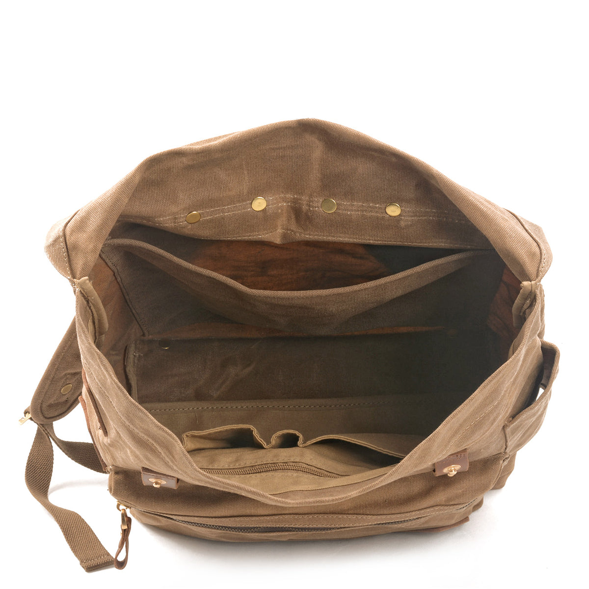 Inside the khaki backpack showing the laptop sleeve and organizer pockets