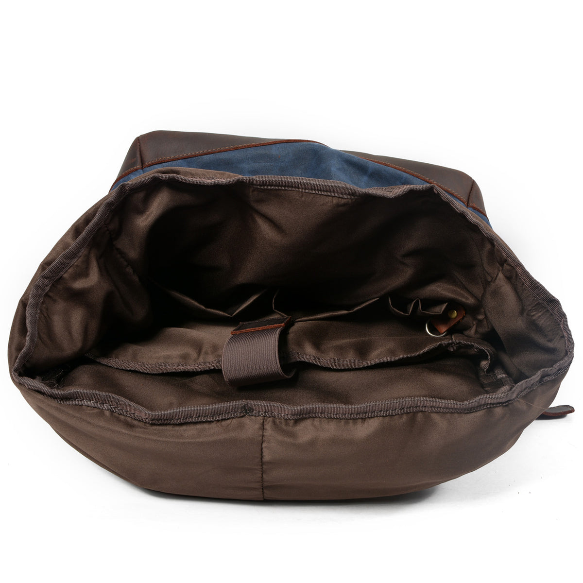Main compartment of the blue backpack with a brown lining