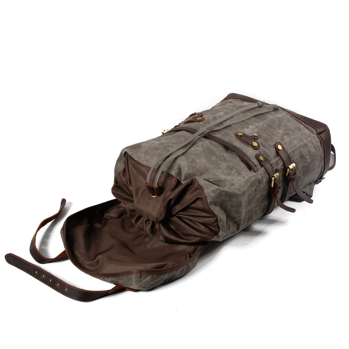 Gray backpack with the flap folded back and drawstring open