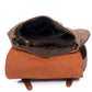 Khaki backpack interior showing the lining and laptop sleeve.