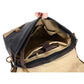 Open messenger bag showing the padded laptop sleeve, fastening strap and interior pockets
