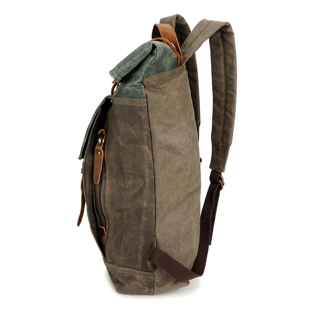 Left-side profile of the Army roll top backpack showing the zip pocket.