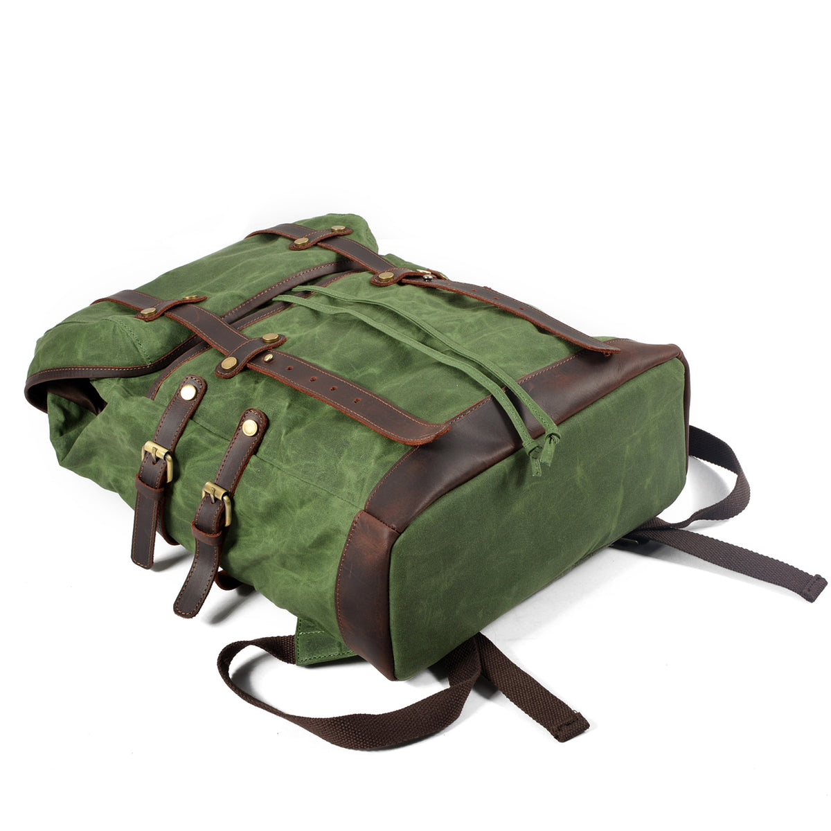 Army waxed canvas rucksack with the roll top closed and leather straps fastened.