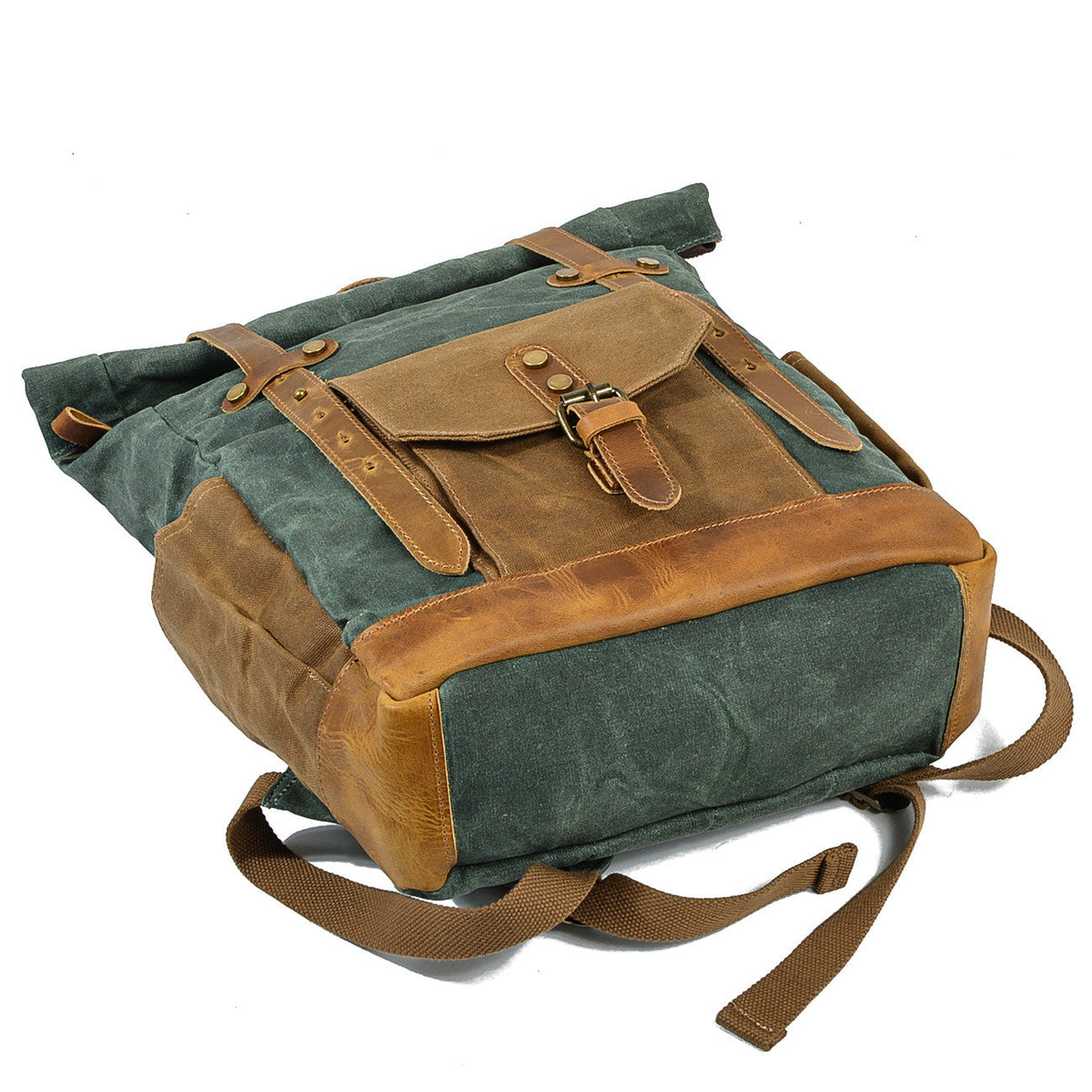 Lake green roll top backpack lying on its base with the front pocket up