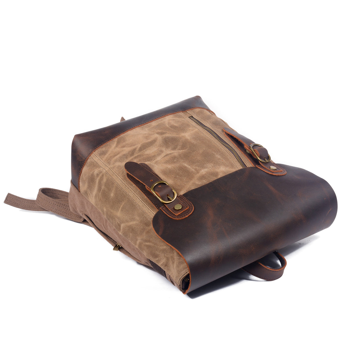 Khaki backpack lying flat with the leather flap and front zipper pocket