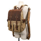 Waxed canvas camera backpack worn on a mannequin to show its size