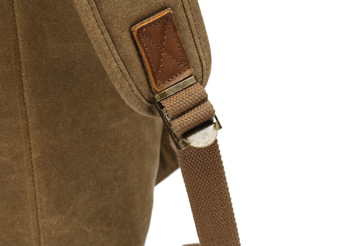 Webbing strap adjuster at the bottom corner