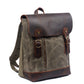 Three-quarter view of the Army backpack with its leather buckle strap.