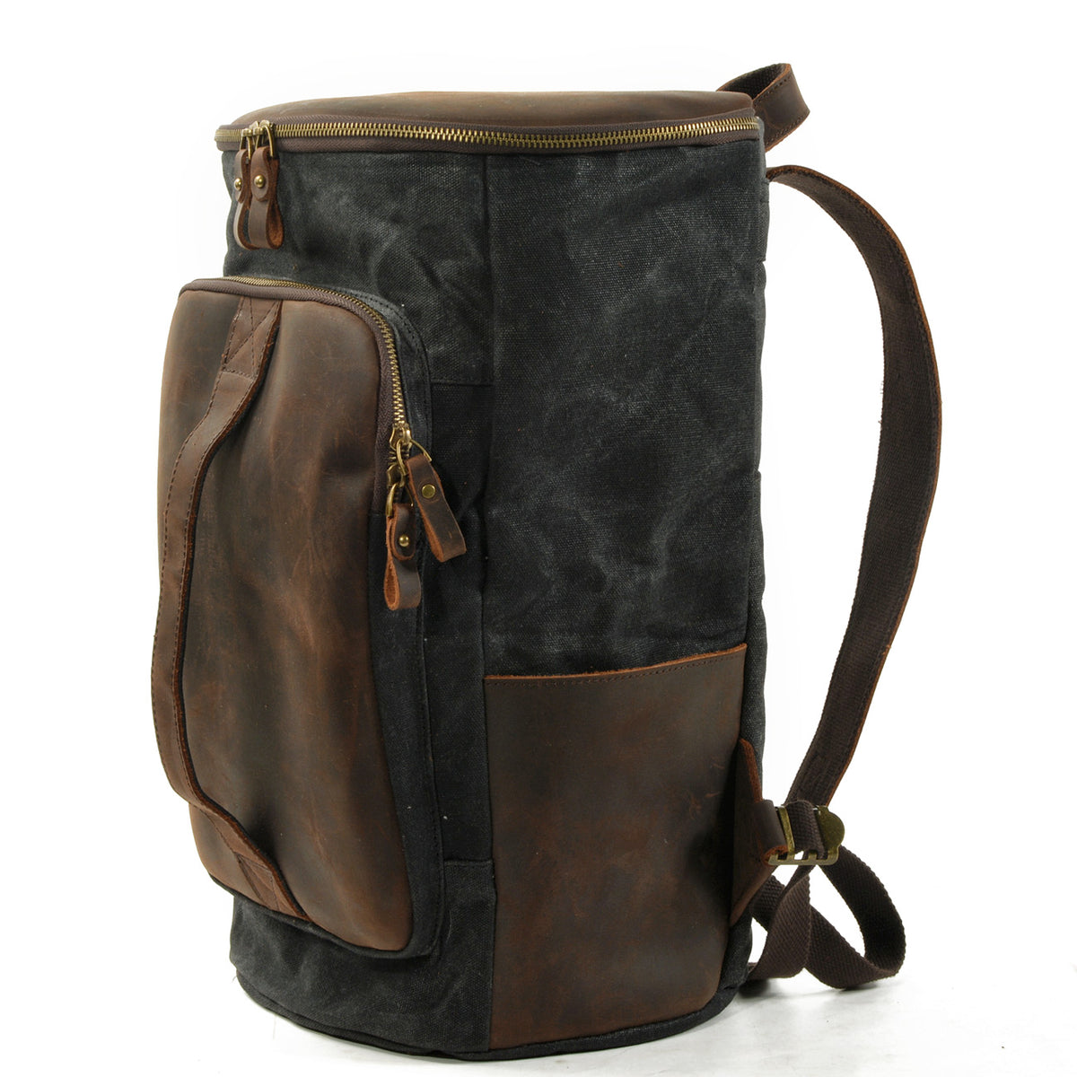 Three-quarter view of the black waxed canvas backpack showing the front pocket depth and side storage