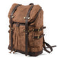 Three-quarter view of the Brown waxed canvas rucksack with its drawstring tied.
