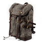 Three-quarter view of the gray backpack showing its side straps