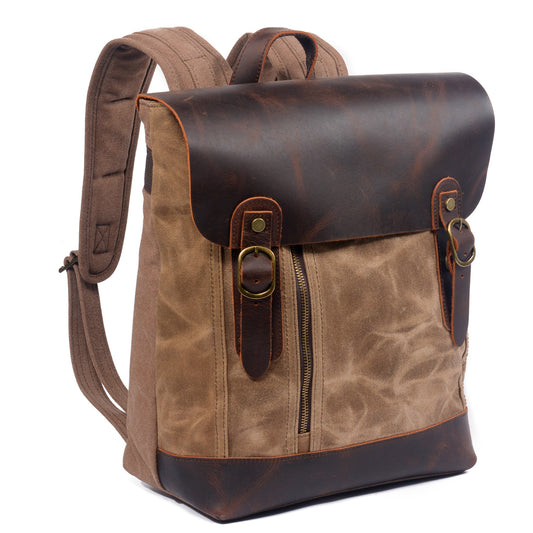 Three-quarter view of the Khaki school backpack with its padded shoulder strap.