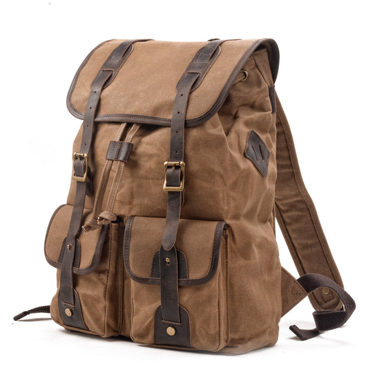 Three-quarter view of the Khaki backpack with its drawstring closure and buckle straps.