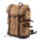 Three-quarter view of the khaki rucksack and its side buckles
