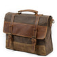 Three-quarter view of the waxed canvas messenger bag showing its leather flap and brass buckles