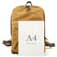 Khaki backpack in front of an A4 sheet to show its size